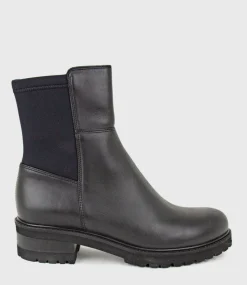 Calista Elastic Back Flat Ankle Boot In Black