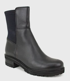 Calista Elastic Back Flat Ankle Boot In Black